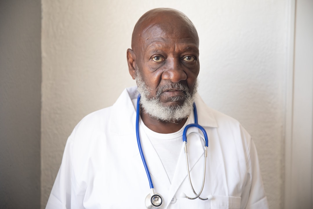 a man wearing a white lab coat